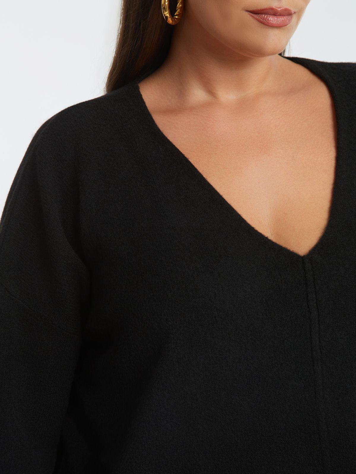 Relaxed fit knit sweater with V-neckline