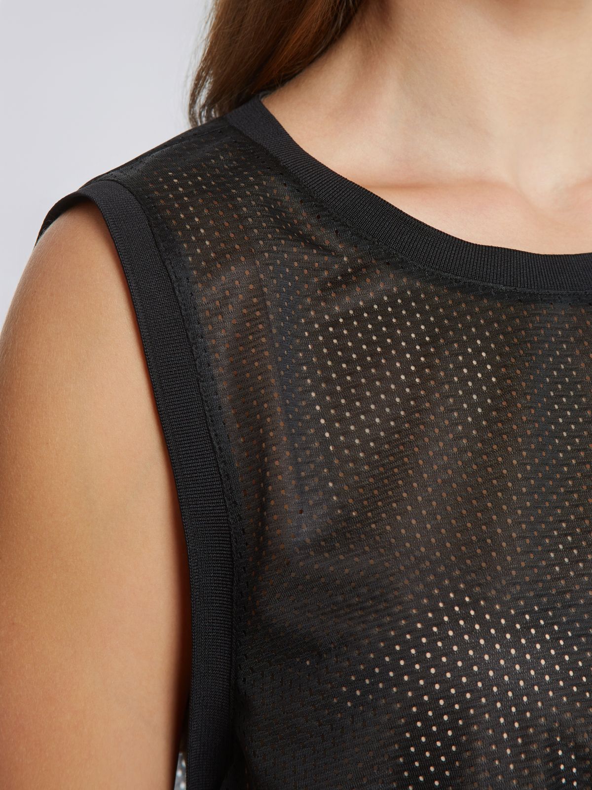 Mesh sleeveless top with adjustable drawstring hem